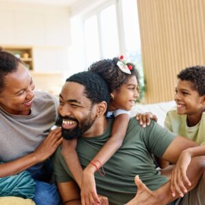 Portrait,Of,A,Happy,Black,Family,Mother,Father,And,Kids
